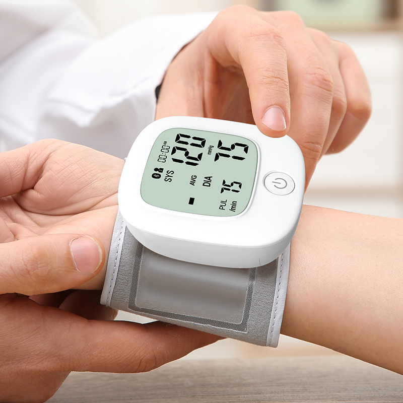 Bluetooth Wrist Blood Pressure Monitor Eyogera Tensiomemter nga eriko Backlit